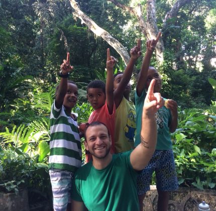 The four boys on our after-school program and volunteer Gabriele point to a monkey in the trees in Parque Lage Rio de Janeiro