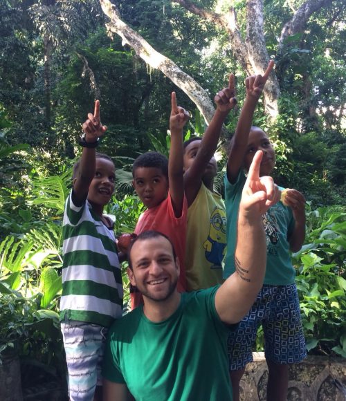 The four boys on our after-school program and volunteer Gabriele point to a monkey in the trees in Parque Lage Rio de Janeiro