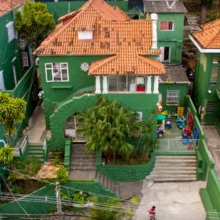 Aerial Shot of Solar Meninos de Luz school showing its green buildings