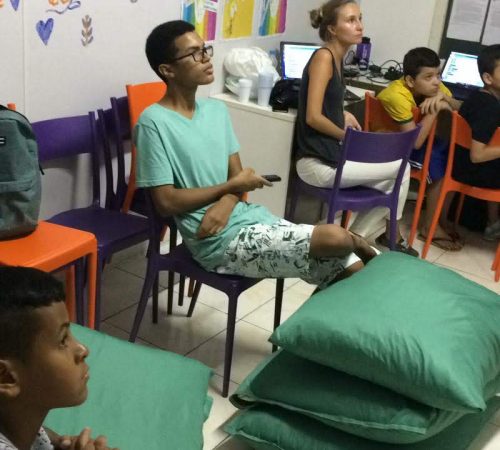 Students on EduMais's Programming Summer Camp in our classroom with their volunteer teachers Roger and Audrey